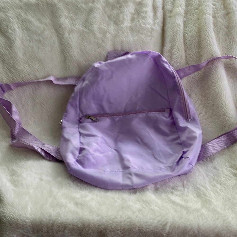 Children’s pink backpack 🎒, not intended for heavy items
